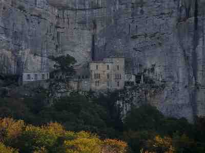 Grotto of St. Mary Magdalene and the Dominican Abbey chiseled into the rock-face, with the chapel of St. Pilon at the top